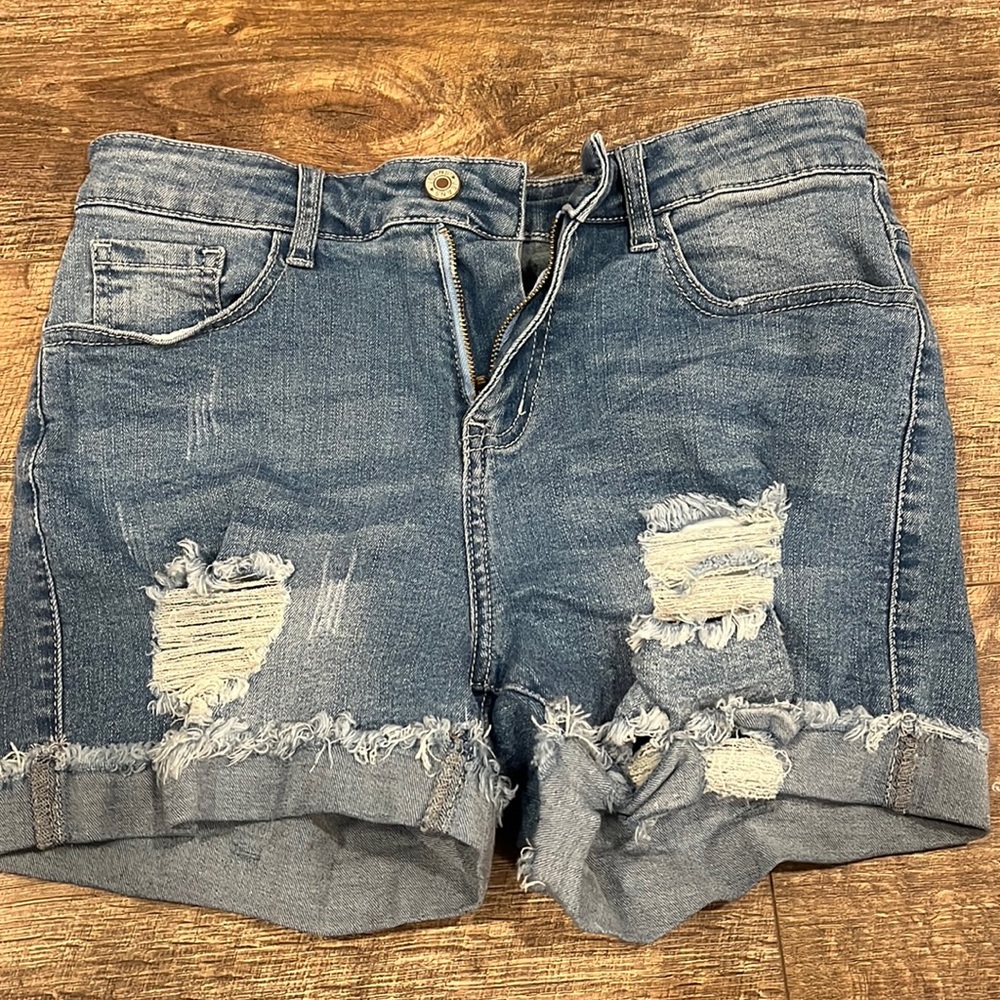 Jean shorts. Distressed look. Size medium.